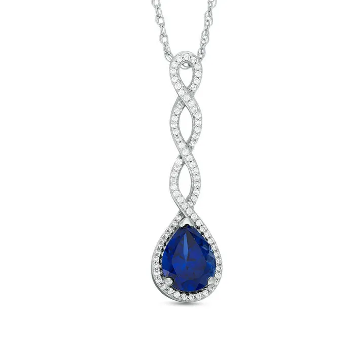 Goldia Earrings PearShaped LabCreated Blue Sapphire and 025 CT TW Diamond Cascading Drop Pendant in Sterling Silver Goldia Earrings PearShaped LabCreated Blue Sapphire and 025 CT TW Diamond Cascading Drop Pendant in Sterling Silver