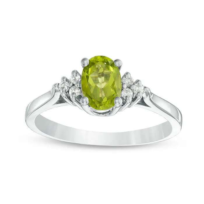 Goldia Rings Oval Peridot and Natural Diamond Accent TriSides Ring in Solid 10K White Gold Goldia Rings Oval Peridot and Natural Diamond Accent TriSides Ring in Solid 10K White Gold