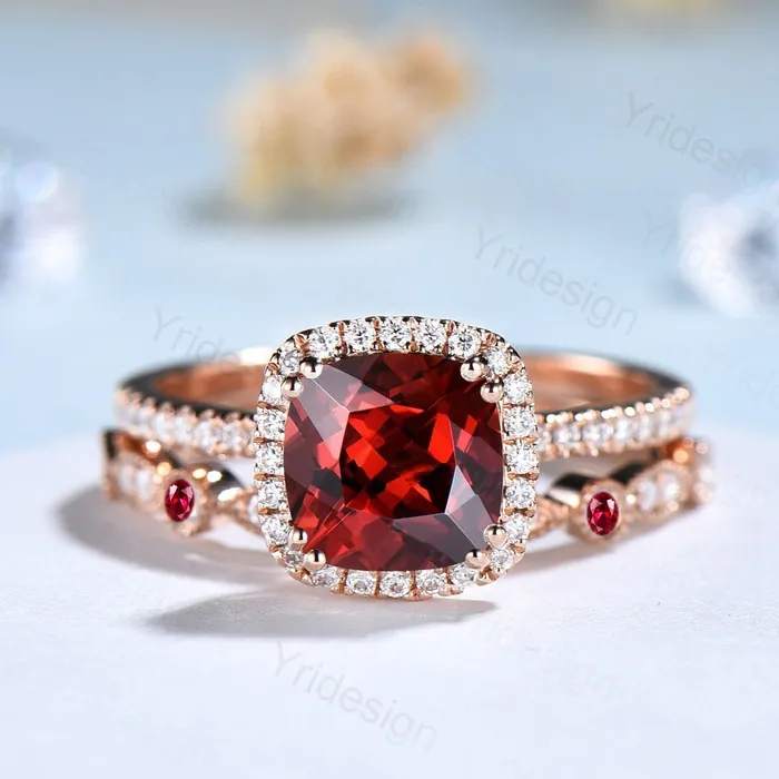 PENFINE Rings Cushion cut garnet wedding ring set 14k rose gold vintage antique garnet engagement ring set for women Art deco halo diamond bridal set PENFINE Rings Cushion cut garnet wedding ring set 14k rose gold vintage antique garnet engagement ring set for women Art deco halo diamond bridal set