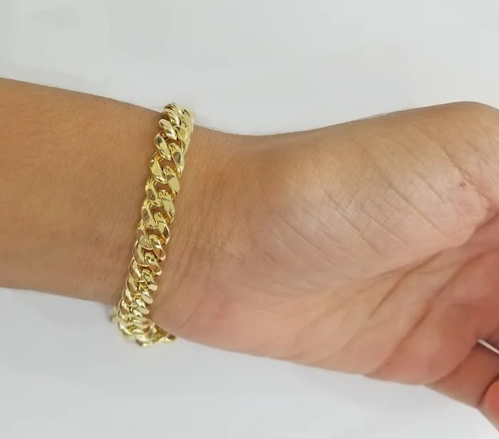 Real 14K Yellow Gold Bracelet Miami Cuban 8 Inch 7mm 14kt Gold Pura Oro Gold and Diamond Bracelets Real 14K Yellow Gold Bracelet Miami Cuban 8 Inch 7mm 14kt Gold Pura Oro Gold and Diamond Bracelets